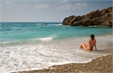 Girl sitting in surf